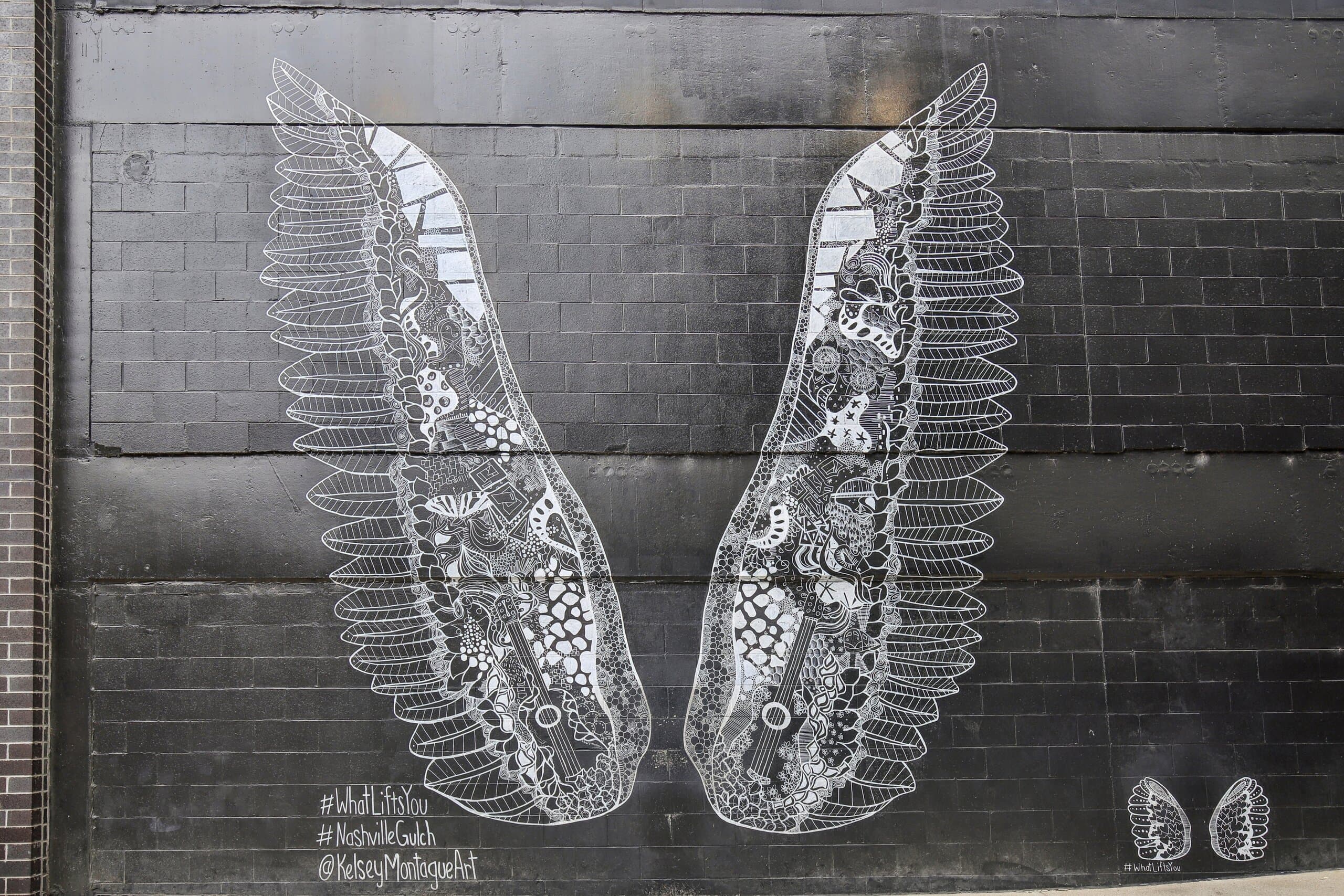 The What Lifts You wings mural, a block from Haven